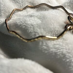 Bracelet Cone, hammered for texture, irregular shape, pearl & clover. Good luck.